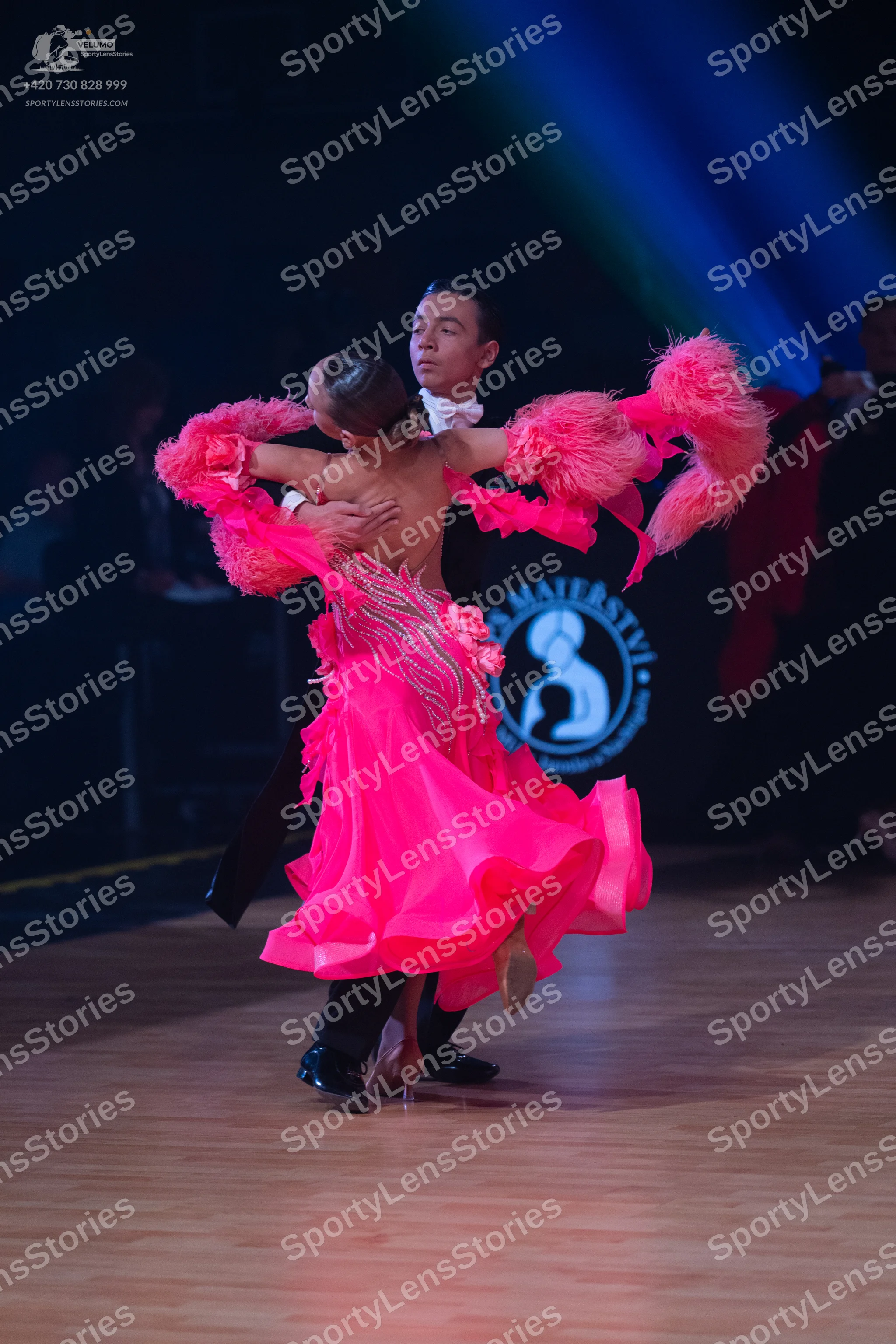 Dancesport competitor: Male dancer: black suit and white shirt