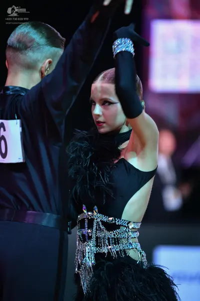 Dancesport competitor: Male dancer: black shirt