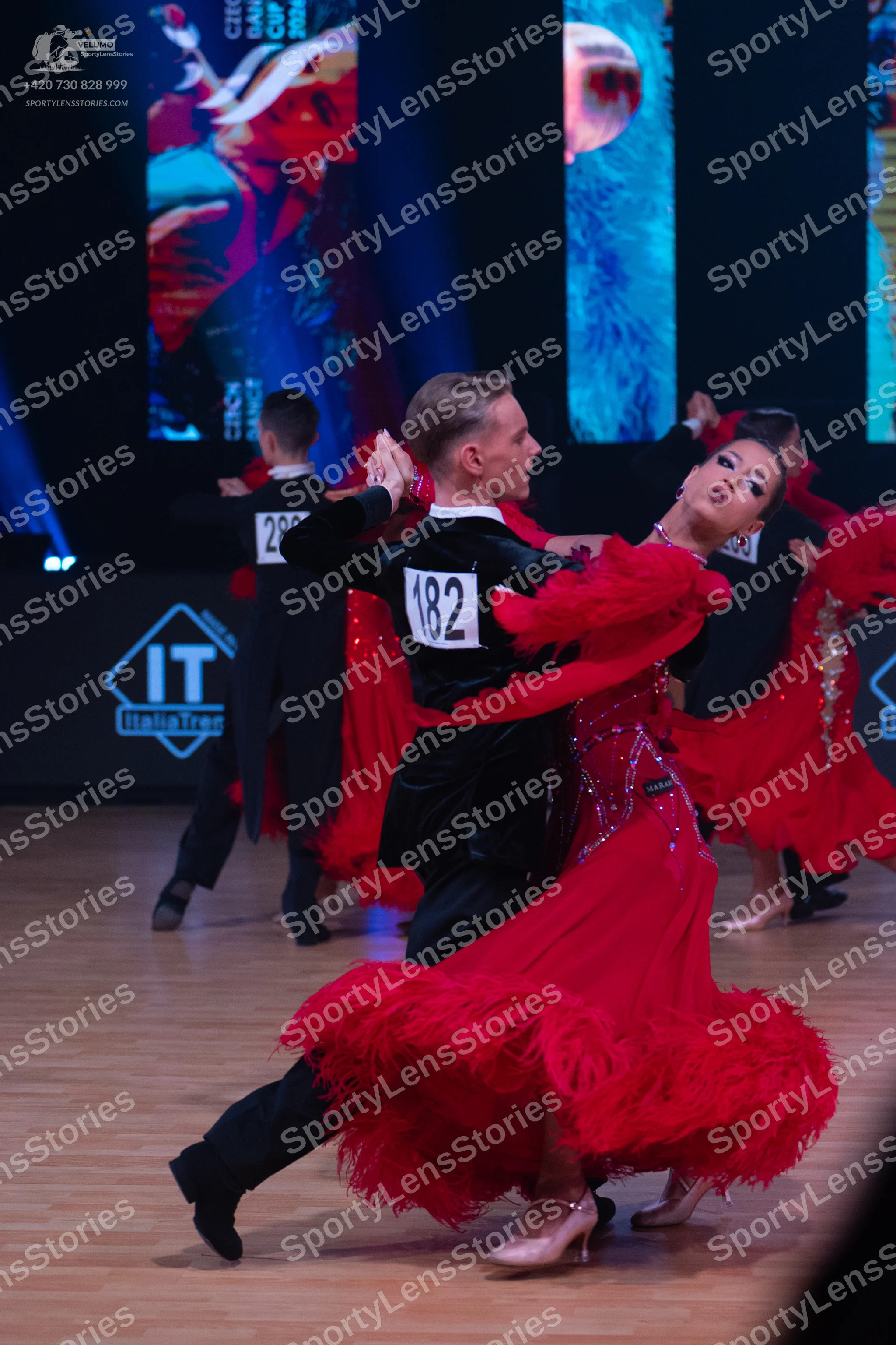 Dancesport competitor: Male dancers: black long-sleeved tops and black trousers