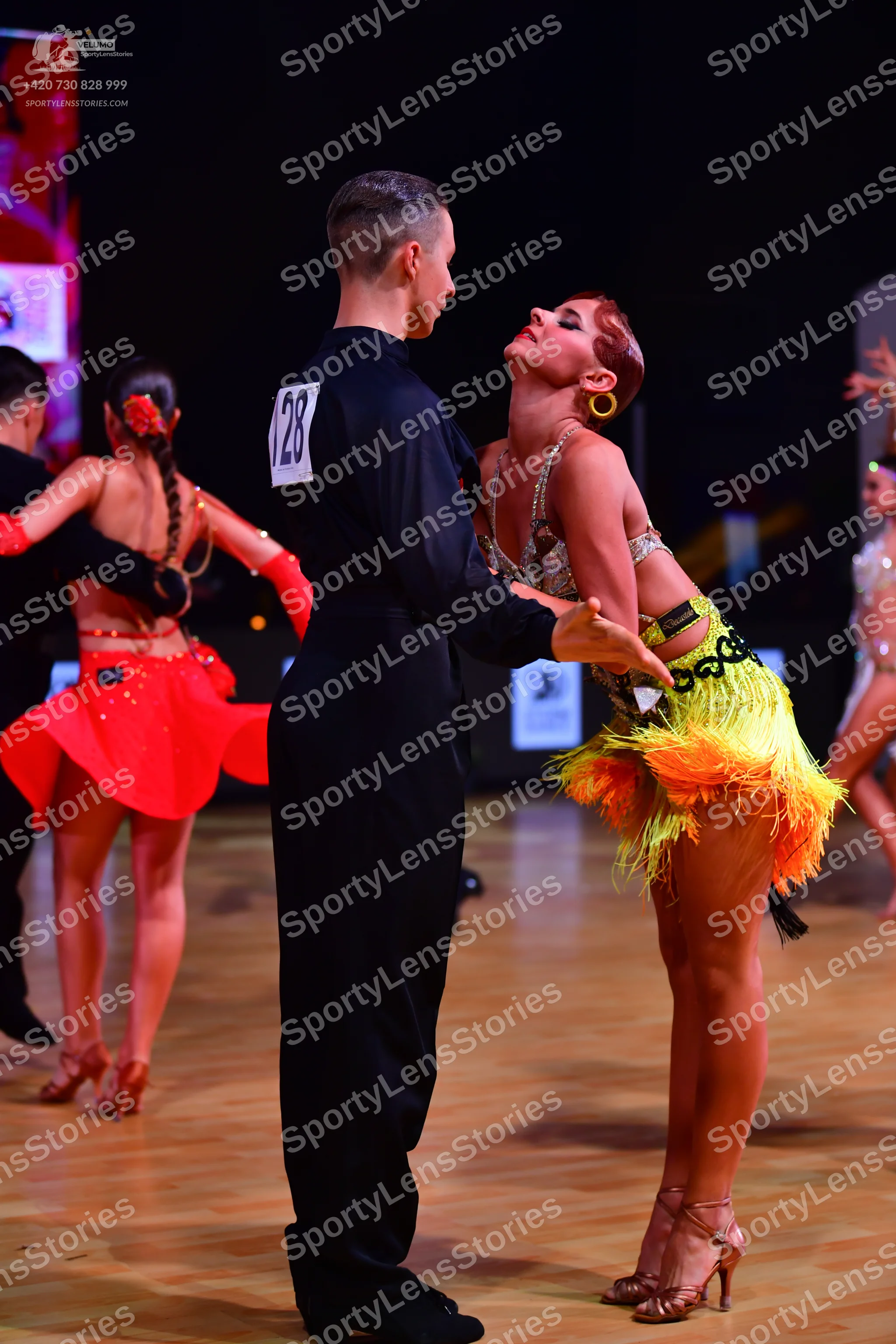 Dancesport competitor: Male dancer: black long-sleeved dance shirt and black trousers