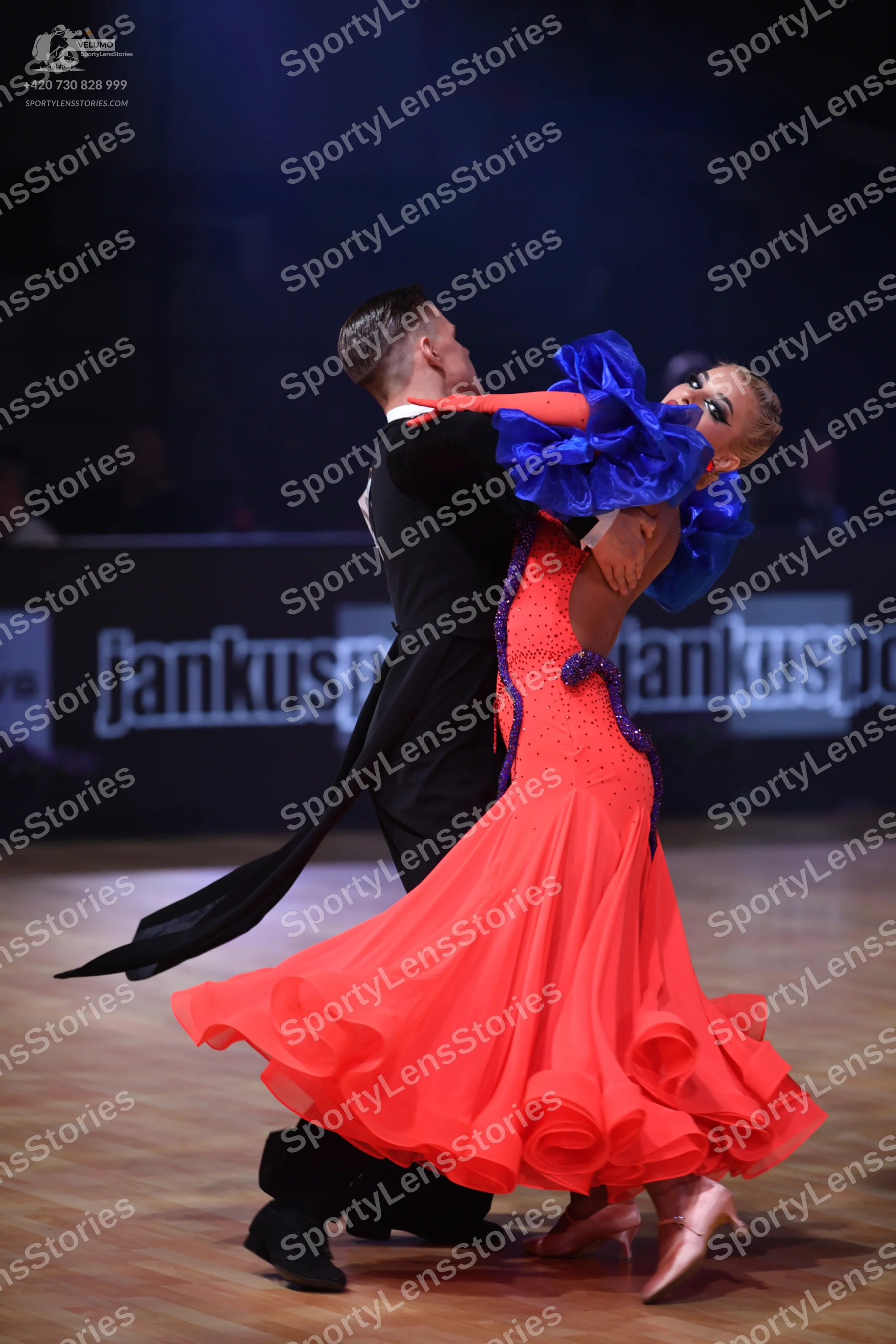 Dancesport competitor: Male dancer: black ballroom tailcoat with a white shirt