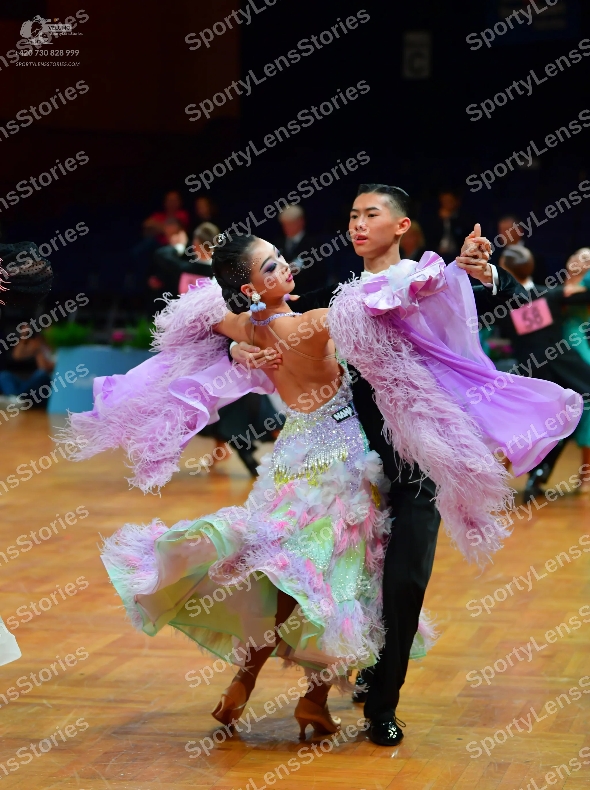 Dancesport competitor: Male dancer: black formal suit
