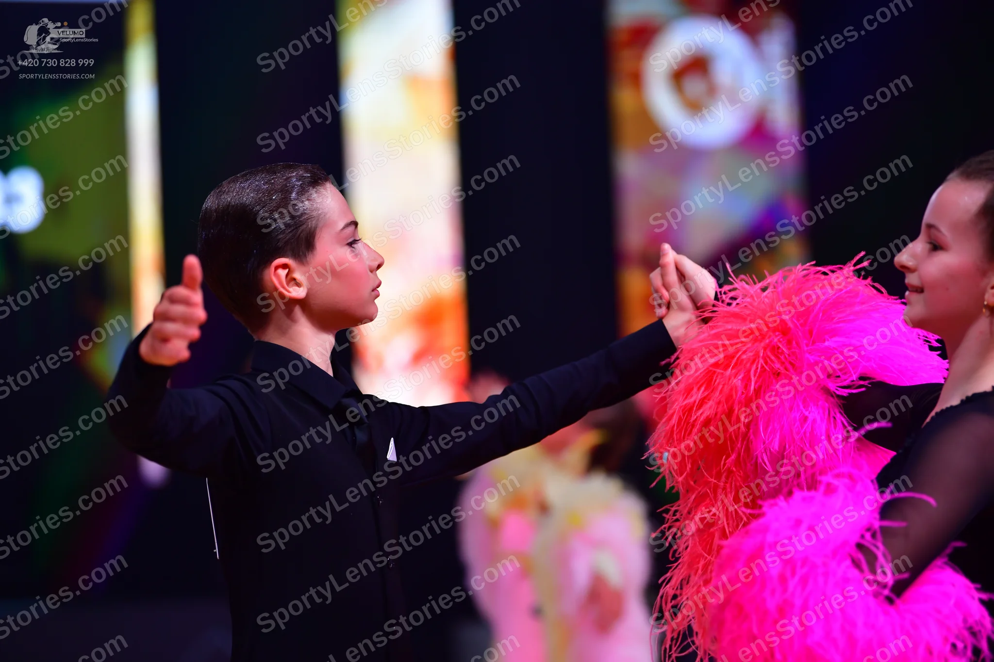 Dancesport competitor: Male dancer: black long-sleeved shirt