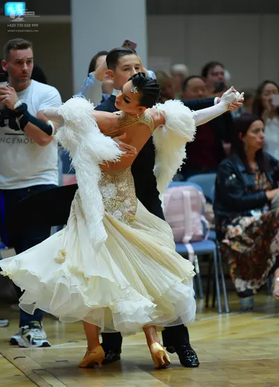 Dancesport competitor: Male dancer: black suit
