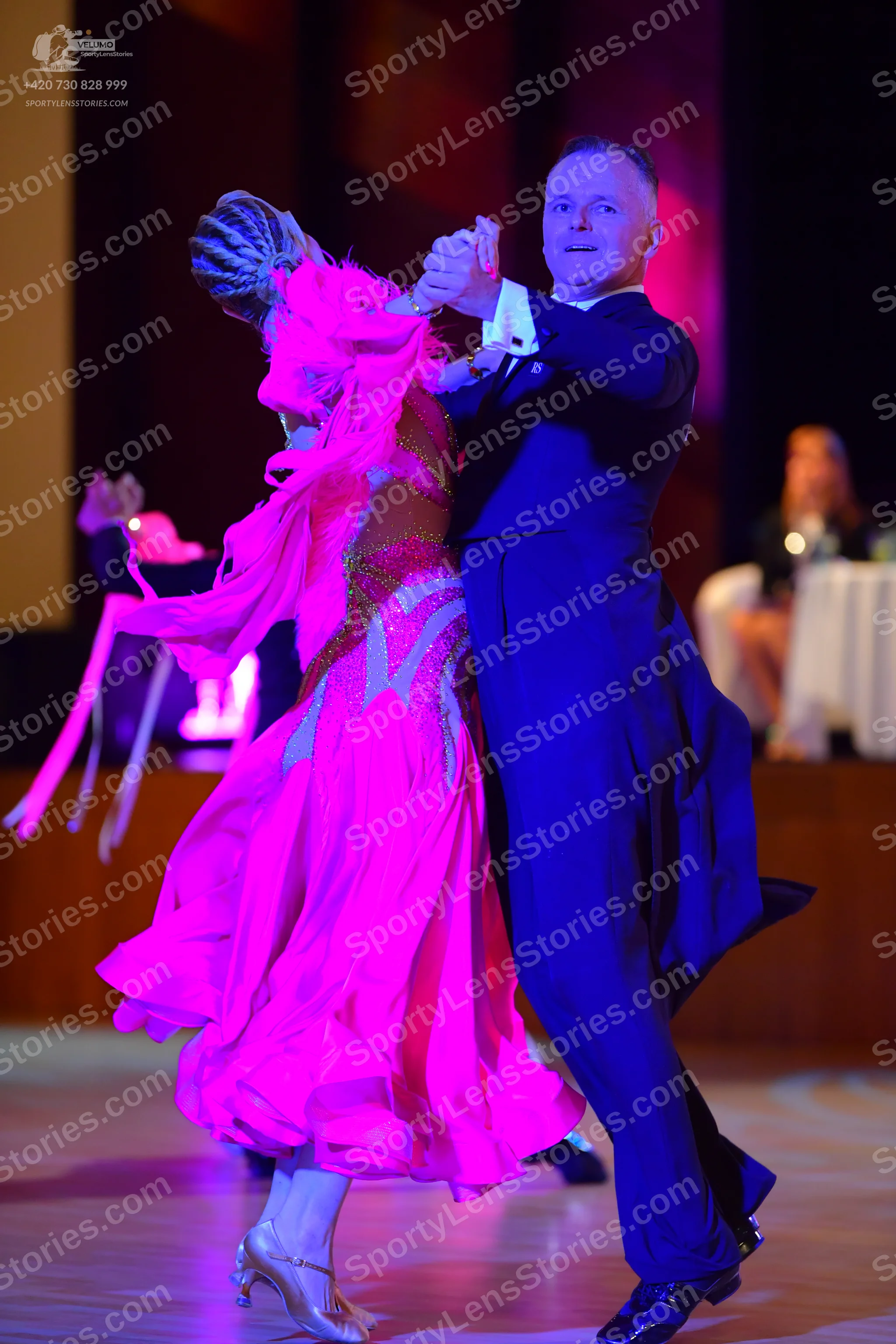Dancesport competitor: ** Male: Black tailsuit with shiny, dark-colored sequin lapels and a satin or sa