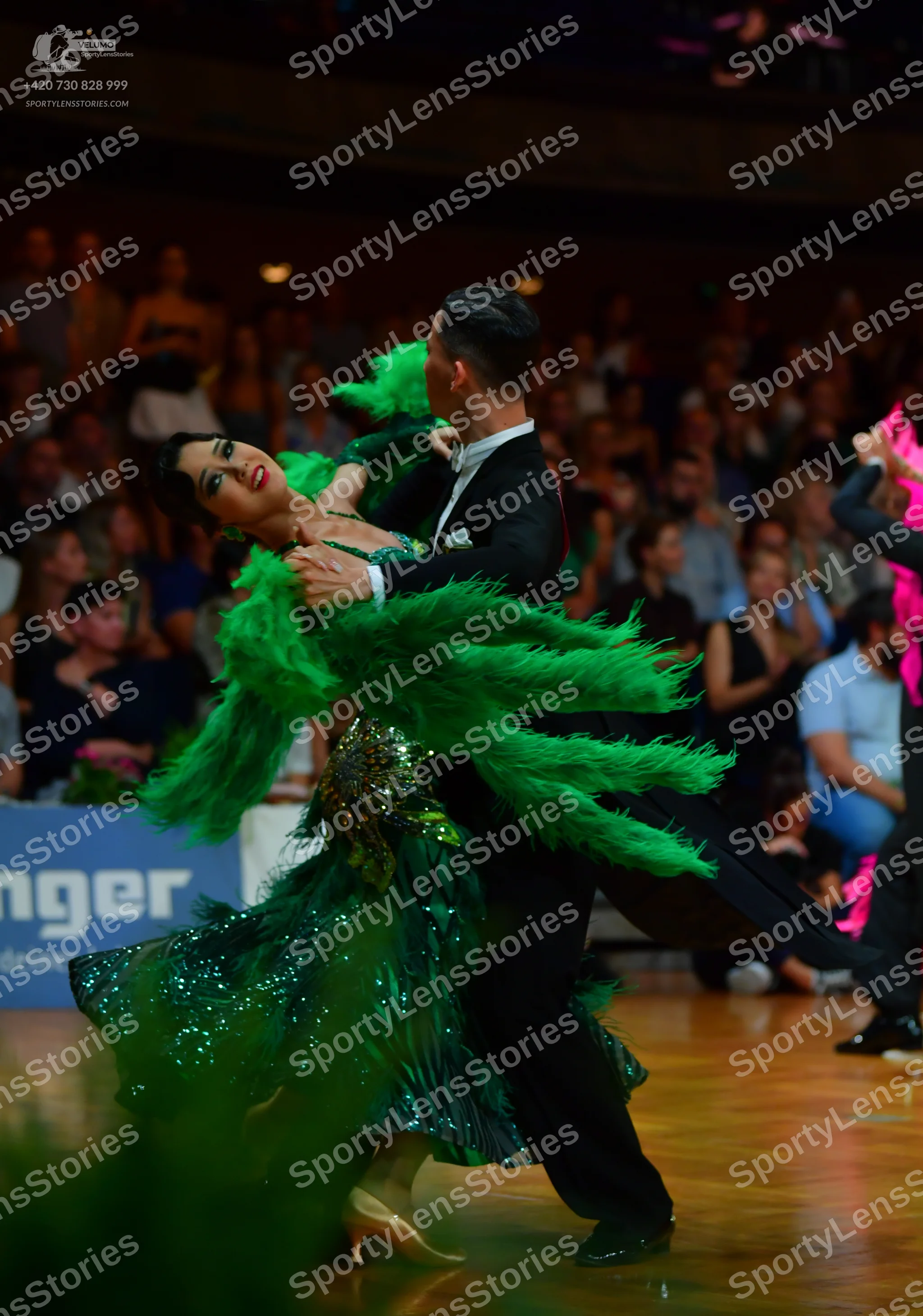 Dancesport competitor: Male dancer: black suit