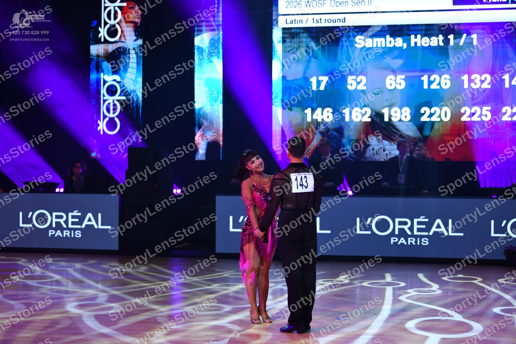 Dancesport competitor: Male dancer: black shirt and black trousers
