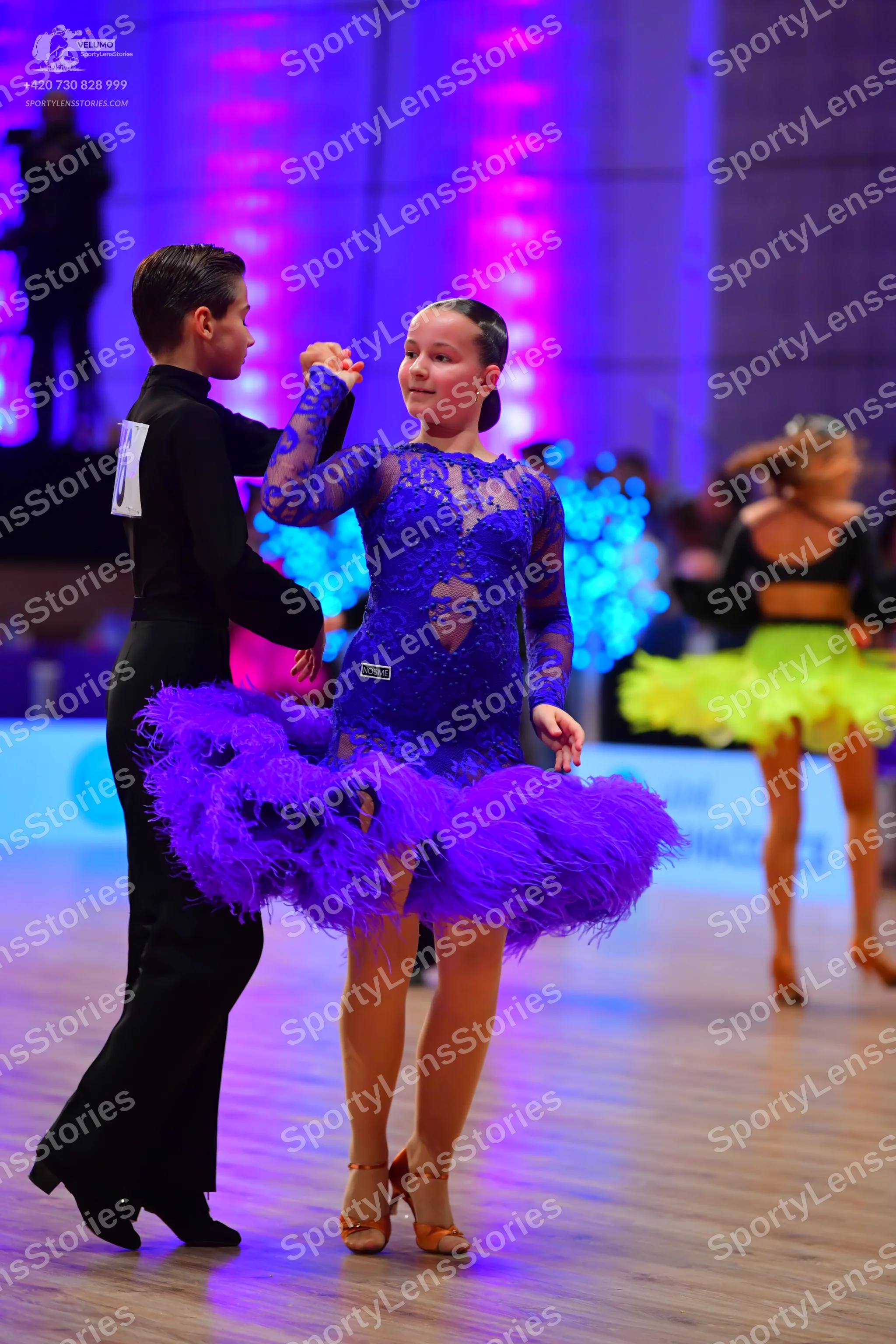 Dancesport competitor: Male dancer: black long-sleeved shirt and black trousers