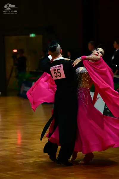 Dancesport competitor #55: Male dancer: black ballroom suit