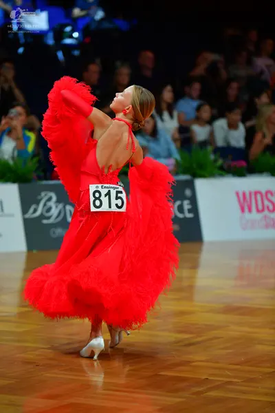 Dancesport competitor #815: Female dancer: red latin dress with voluminous red fringe