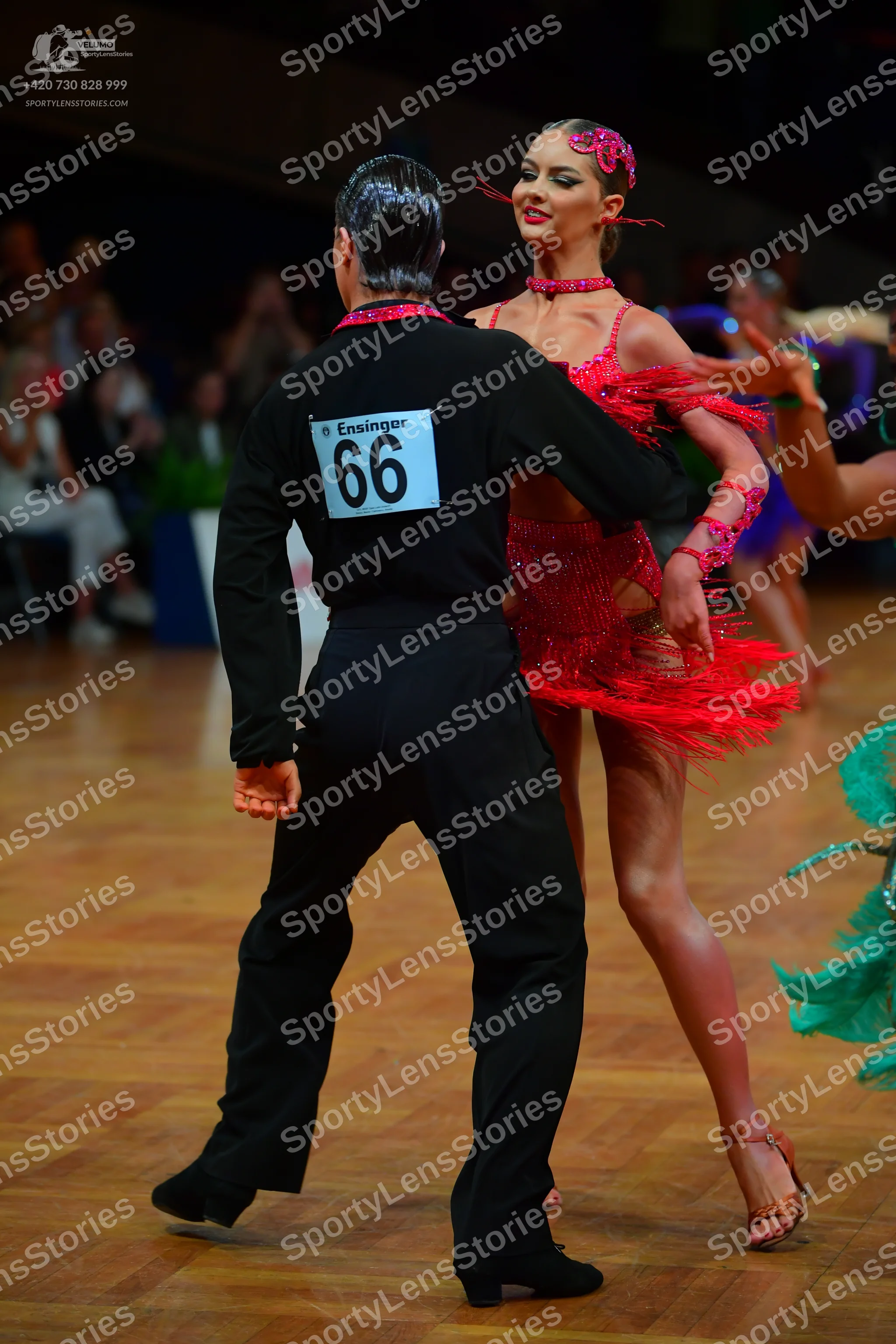 Dancesport competitor #66: Male dancer: black long-sleeved shirt and black trousers