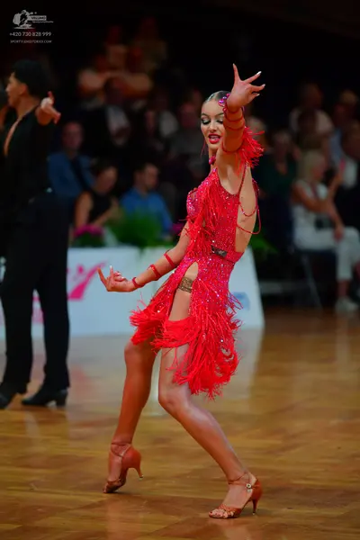 Dancesport competitor: Male dancer: black shirt and black trousers