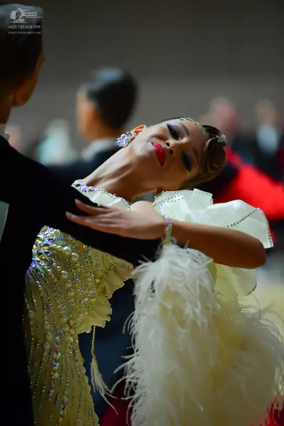 Dancesport competitor: Male dancer: black suit