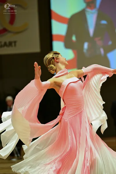 Dancesport competitor: ** Male: Black suit with a white sequin lapel