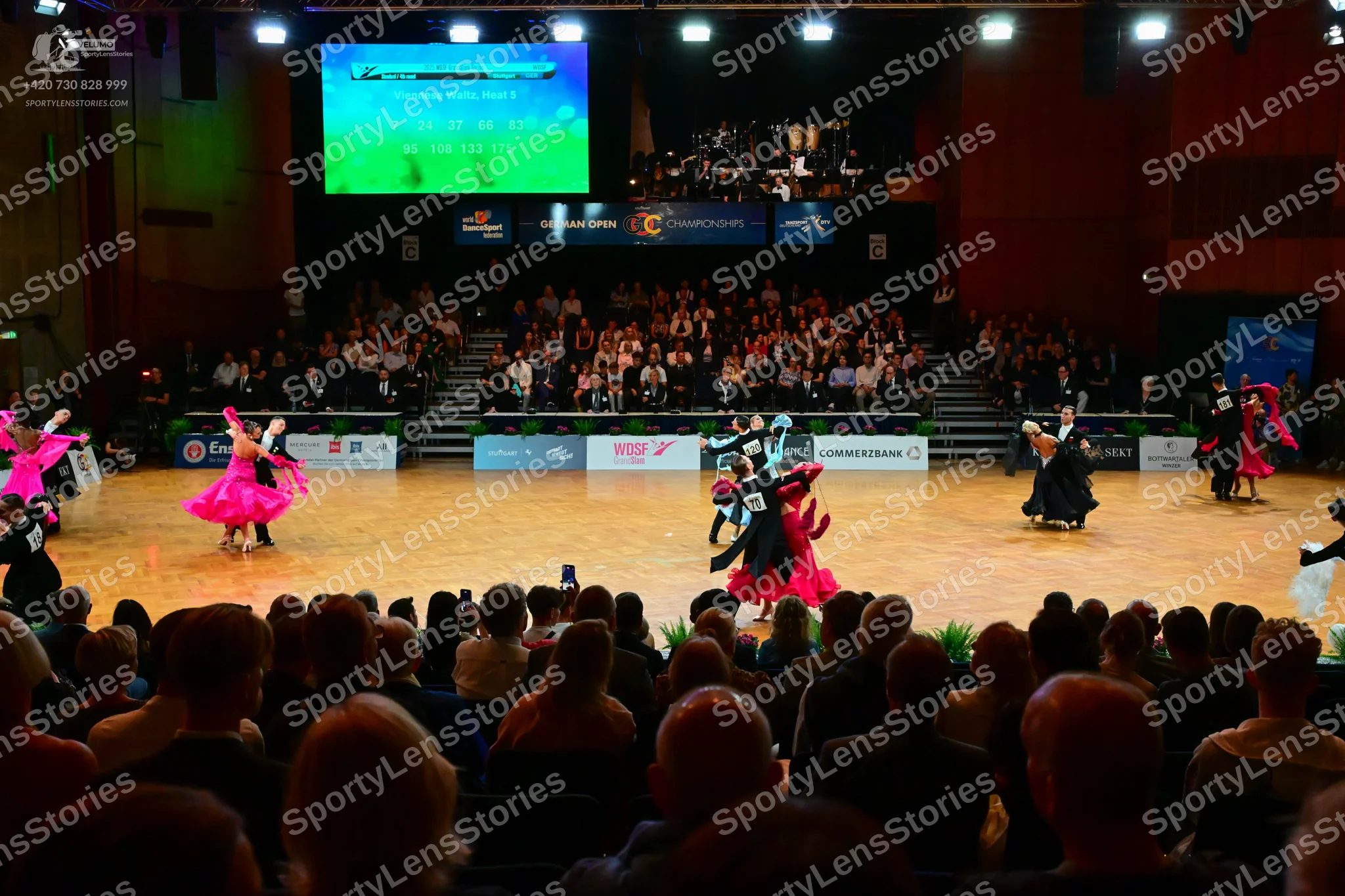 Dancesport competitor: Female dancer: bright pink latin dress