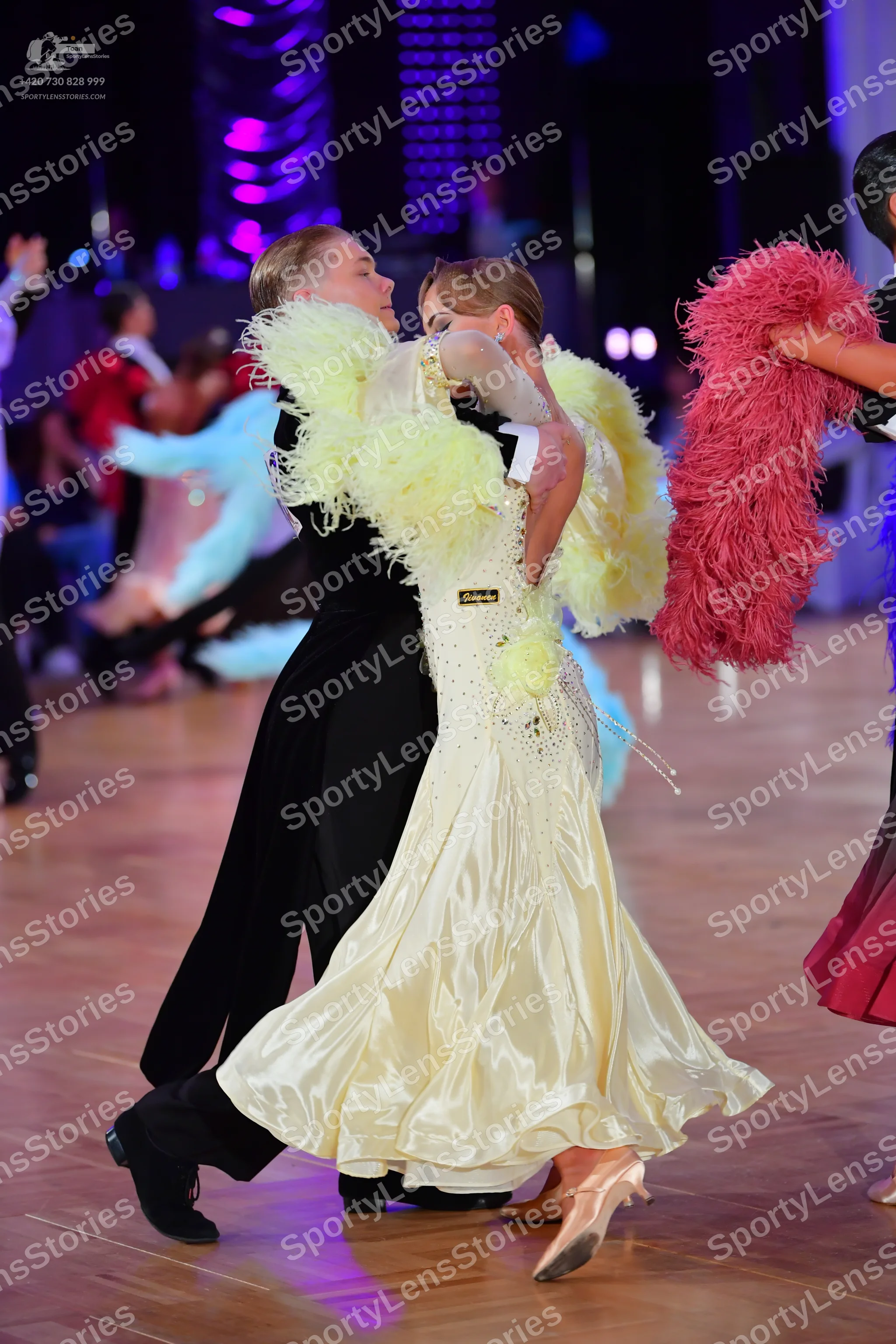 Dancesport competitor: Male dancer: black suit