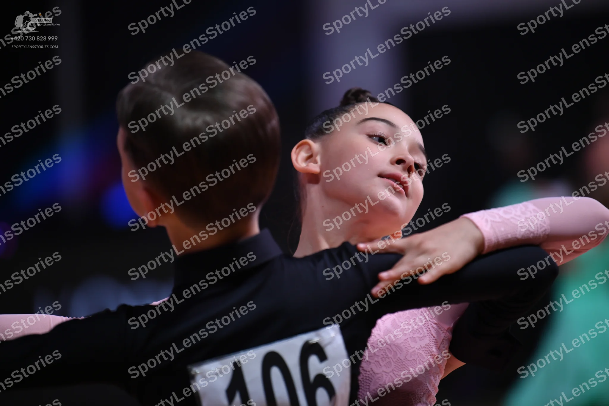 Dancesport competitor: Male dancer: black long-sleeved shirt