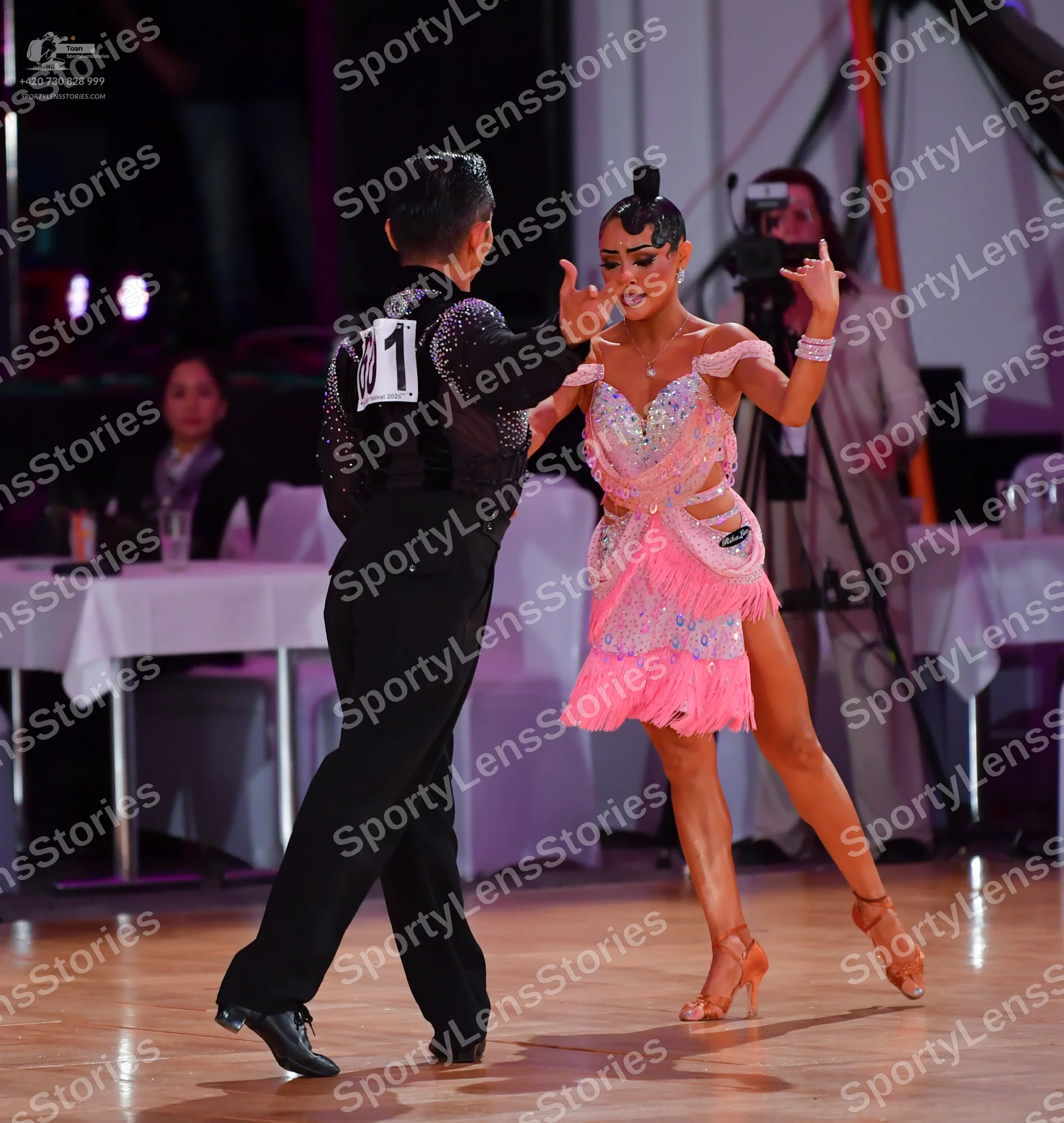 Dancesport competitor #31: Male dancer: black long-sleeved shirt with subtle sequin embellishments, black t