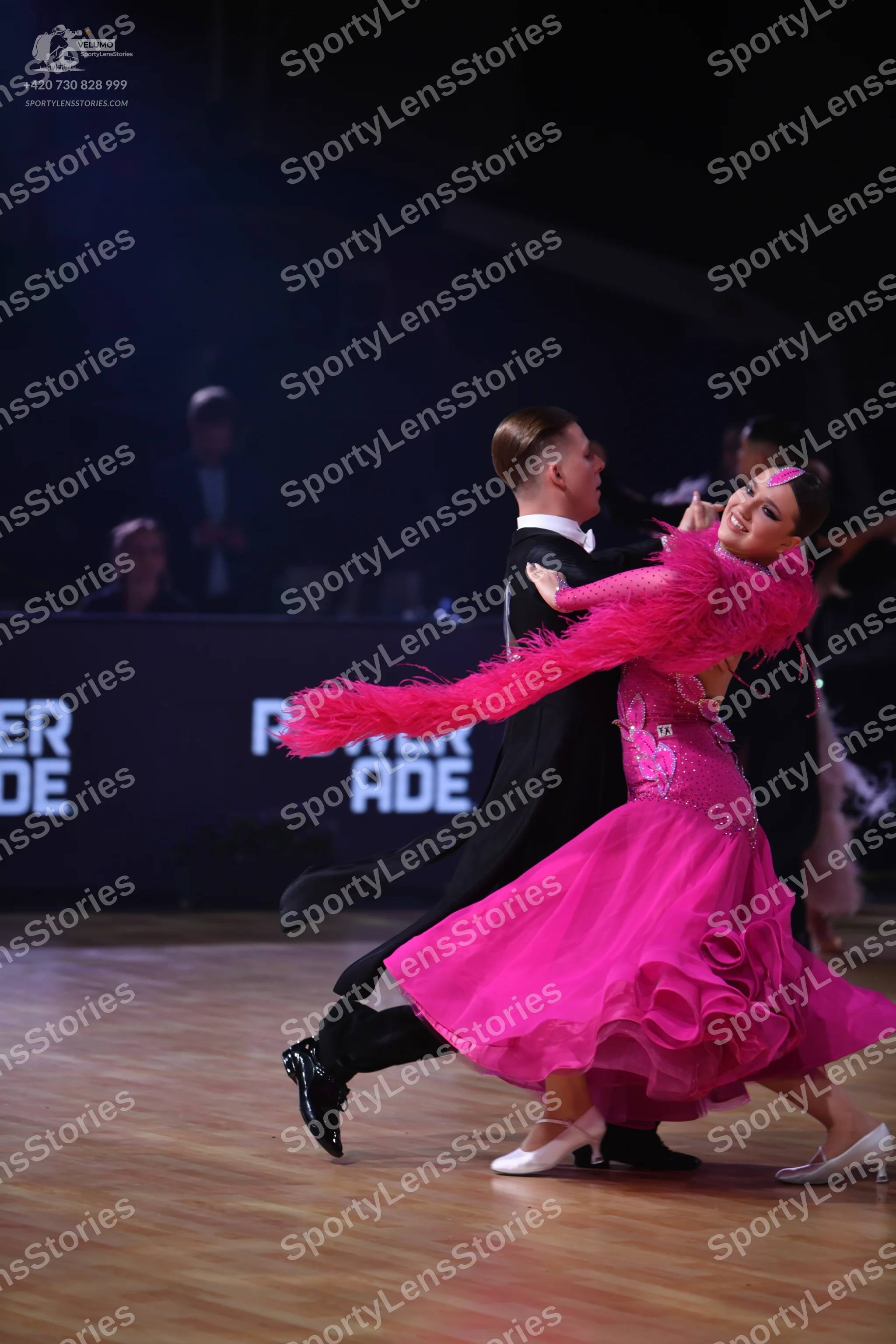 Dancesport competitor: Male dancer: black ballroom suit with black trousers and black dance shoes
