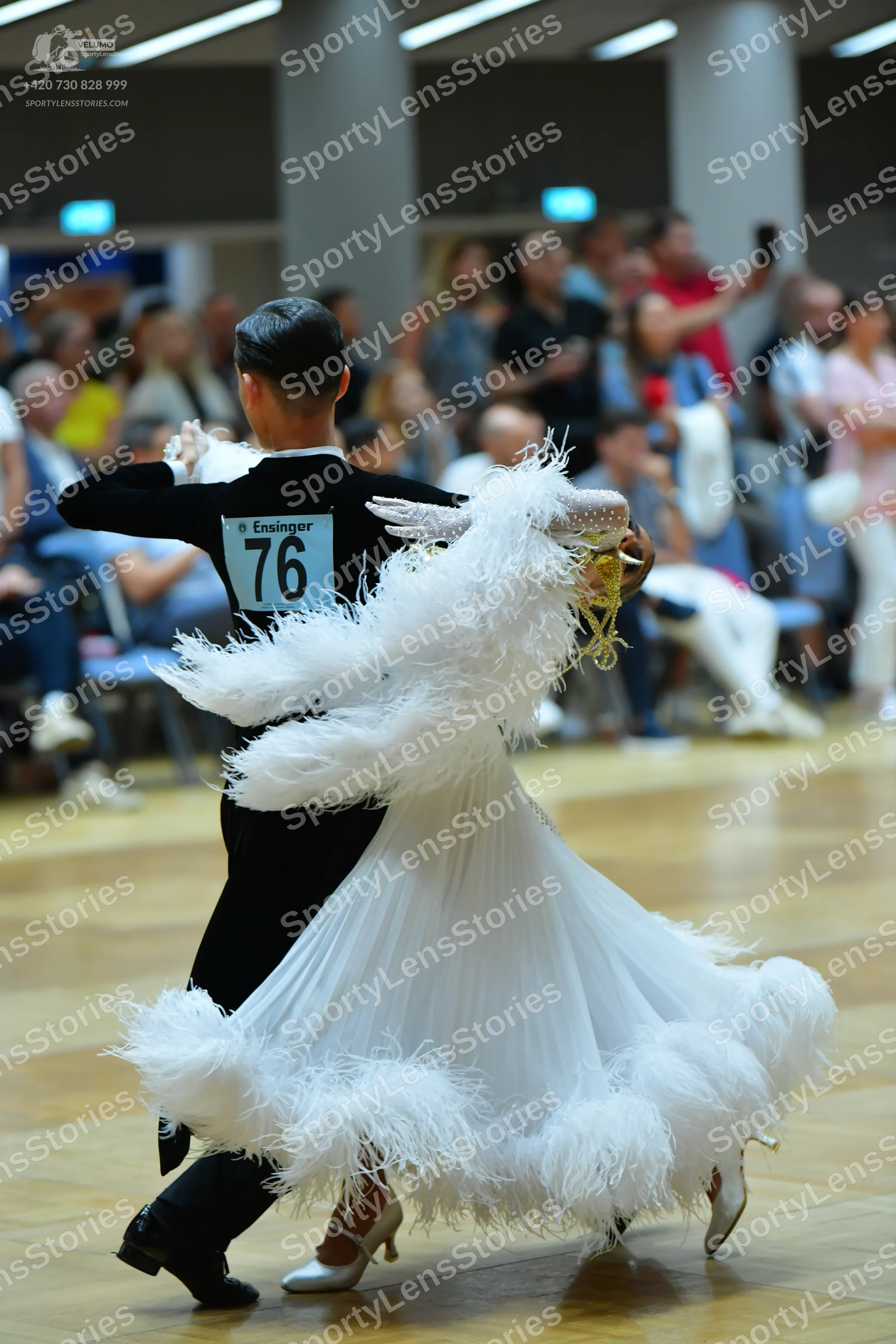 Dancesport competitor #76: Male dancer: black long-sleeved shirt and black trousers with black dance shoes