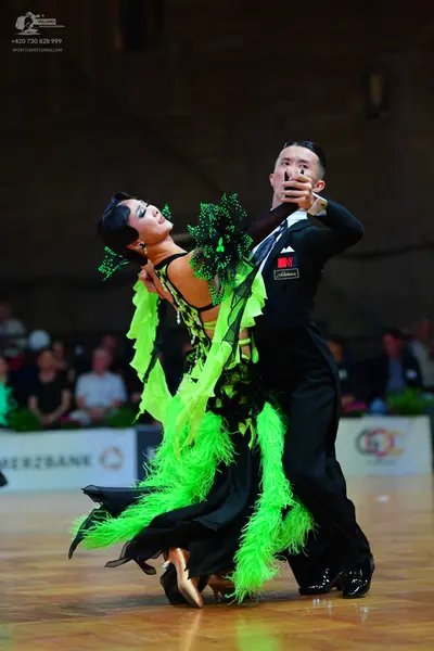 Dancesport competitor: Male dancer: black suit
